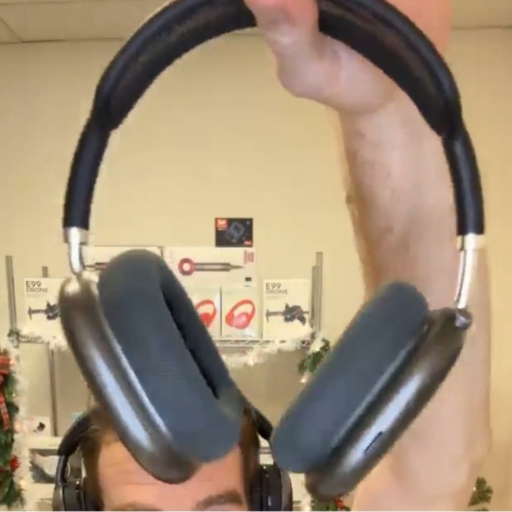 Black Over-Ear Headphones with Large Cushioned Ear Cups and Sleek Design